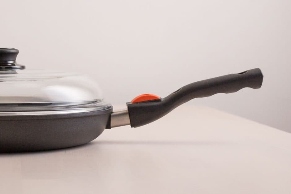 Two pans side by side on a surface.